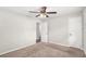 Well-lit bedroom with neutral walls, carpet, and ceiling fan at 2456 Colorado Sw Trl, Atlanta, GA 30331