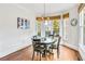 Breakfast nook features an oval table with four chairs and a view to the backyard at 5060 Rosedown Pl, Roswell, GA 30076