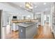 Spacious kitchen with large island and ample cabinet storage at 5060 Rosedown Pl, Roswell, GA 30076