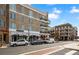 Street view of shops and restaurants in a town at 5060 Rosedown Pl, Roswell, GA 30076