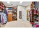 Large walk-in closet with ample shelving and hanging space at 5060 Rosedown Pl, Roswell, GA 30076