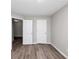 Bedroom with two doors and vinyl plank flooring at 533 Halley Way, Stockbridge, GA 30281