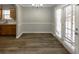 Bright dining room with hardwood floors and access to a patio at 533 Halley Way, Stockbridge, GA 30281