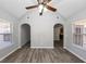 Dining Room with grey walls, wood-look flooring, and archways at 533 Halley Way, Stockbridge, GA 30281