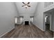 Spacious living room with vaulted ceiling, fireplace, and hardwood floors at 533 Halley Way, Stockbridge, GA 30281