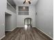 Vaulted ceiling living room with loft and hardwood floors at 533 Halley Way, Stockbridge, GA 30281