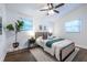 Cozy bedroom featuring hardwood floors, neutral decor, and natural light at 116 Turman Se Ave, Atlanta, GA 30315