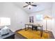 Bright home office with vaulted ceiling features a modern desk, stylish rug, and ample natural light at 116 Turman Se Ave, Atlanta, GA 30315