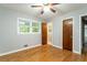 Bedroom with hardwood floors and ceiling fan at 1792 Hammond Woods Sw Cir, Marietta, GA 30008