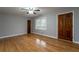 Hardwood floor bedroom with neutral walls at 1792 Hammond Woods Sw Cir, Marietta, GA 30008