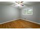 Well-lit bedroom with hardwood floors and ceiling fan at 1792 Hammond Woods Sw Cir, Marietta, GA 30008