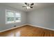 Bright bedroom with hardwood floors and ceiling fan at 1792 Hammond Woods Sw Cir, Marietta, GA 30008