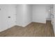 Spacious basement bedroom with hardwood floors and an attached bathroom at 3094 Jonesboro St, Ellenwood, GA 30294