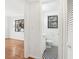 A hallway view of a bathroom featuring black and white checkerboard flooring at 320 3Rd Ne St # 1, Atlanta, GA 30308
