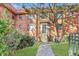 Inviting brick apartment building featuring a manicured lawn and a walkway to the front entrance at 320 3Rd Ne St # 1, Atlanta, GA 30308