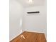 A small room with hardwood floors and a floating shelf at 320 3Rd Ne St # 1, Atlanta, GA 30308