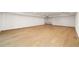 Finished basement with light oak hardwood floors and recessed lighting at 3566 Cantrell Ne Rd, Atlanta, GA 30319