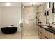 Modern bathroom features a freestanding tub, walk-in shower, and stylish vanity at 3566 Cantrell Ne Rd, Atlanta, GA 30319