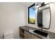 Modern bathroom with floating vanity,black sink and sleek fixtures at 3566 Cantrell Ne Rd, Atlanta, GA 30319