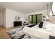 Bright bedroom features a large window, comfortable bed, and modern dresser at 3566 Cantrell Ne Rd, Atlanta, GA 30319