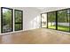 Spacious bedroom with hardwood floors and large windows at 3566 Cantrell Ne Rd, Atlanta, GA 30319