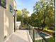 Private deck overlooking the backyard, pool, and surrounding trees at 3566 Cantrell Ne Rd, Atlanta, GA 30319