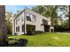 Modern home with large windows and green lawn at 3566 Cantrell Ne Rd, Atlanta, GA 30319