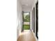 Hallway with glass door leading to a private outdoor space at 3566 Cantrell Ne Rd, Atlanta, GA 30319