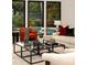 Spacious living area features large windows, pool view, and stylish furniture at 3566 Cantrell Ne Rd, Atlanta, GA 30319