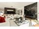 Modern living room with a marble fireplace and open floor plan at 3566 Cantrell Ne Rd, Atlanta, GA 30319