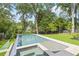 Modern, rectangular pool with spa and spacious deck at 3566 Cantrell Ne Rd, Atlanta, GA 30319