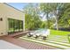 Inviting pool area with plenty of lounge chairs and a fire pit at 3566 Cantrell Ne Rd, Atlanta, GA 30319