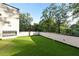 Private rooftop deck with artificial turf and built-in fireplace at 3566 Cantrell Ne Rd, Atlanta, GA 30319