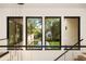 Stunning backyard view from large windows, showcasing trees and pool at 3566 Cantrell Ne Rd, Atlanta, GA 30319
