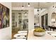 Modern wine cellar with glass doors showcasing an extensive collection at 3566 Cantrell Ne Rd, Atlanta, GA 30319