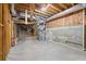Unfinished basement area with exposed utilities and concrete floor at 5615 Forkwood Nw Dr, Acworth, GA 30101