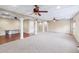 Large open basement featuring high ceilings and multiple ceiling fans at 5615 Forkwood Nw Dr, Acworth, GA 30101