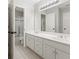 Bathroom boasts double vanity, a shower, and updated fixtures at 5615 Forkwood Nw Dr, Acworth, GA 30101