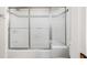 Clean bathroom with shower/tub combo and updated tile at 5615 Forkwood Nw Dr, Acworth, GA 30101