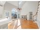 Breakfast room with stone fireplace and hardwood floors at 5615 Forkwood Nw Dr, Acworth, GA 30101