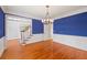 Formal dining room with hardwood floors and chandelier at 5615 Forkwood Nw Dr, Acworth, GA 30101