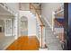 Two-story entryway with hardwood floors and staircase at 5615 Forkwood Nw Dr, Acworth, GA 30101