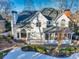 Two-story white home with large screened porch and deck at 5615 Forkwood Nw Dr, Acworth, GA 30101