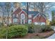 Brick two story house with a large driveway at 5615 Forkwood Nw Dr, Acworth, GA 30101