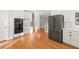 Kitchen with built-in desk and stainless steel fridge at 5615 Forkwood Nw Dr, Acworth, GA 30101