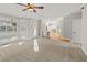 Open living room with hardwood floors and kitchen views at 5615 Forkwood Nw Dr, Acworth, GA 30101