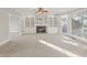 Living room with fireplace and built-in shelving at 5615 Forkwood Nw Dr, Acworth, GA 30101