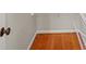 Walk-in pantry with wire shelving and hardwood floors at 5615 Forkwood Nw Dr, Acworth, GA 30101