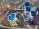 Freeform pool, hot tub, and patio area in backyard at 5615 Forkwood Nw Dr, Acworth, GA 30101