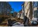 Deck overlooks private backyard with wooded views at 605 Rose Creek Cir, Duluth, GA 30097